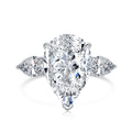 The Georgina pear three-stone ring in sterling silver with a 6ct pear-cut zirconia center stone and pear side stones