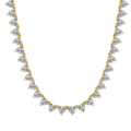 Heart-cut cz tennis necklace in 18k gold vermeil with hand-set clear heart-shaped stones by Viviana Halil