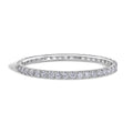 Moissanite bangle bracelet in sterling silver with round-cut stones by Viviana Halil.