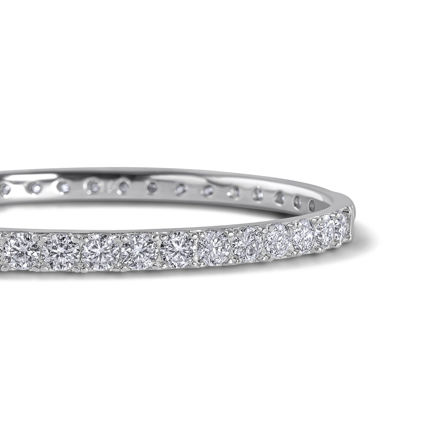 solid silver bangle with round brilliant moissanite stones all around by Viviana Halil

