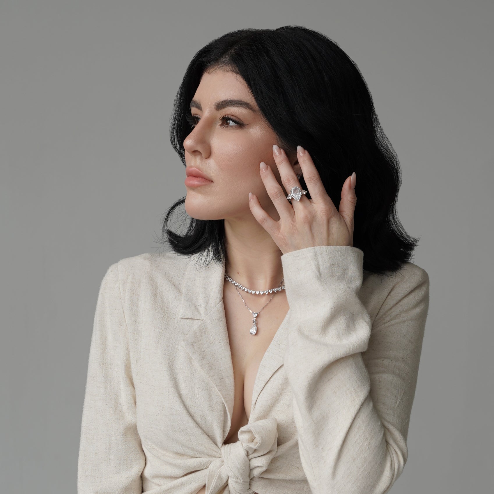 woman wearing cubic zirconia jewelry