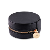 Top view of compact travel jewelry organizer round box black vegan leather  and gold hardware VH