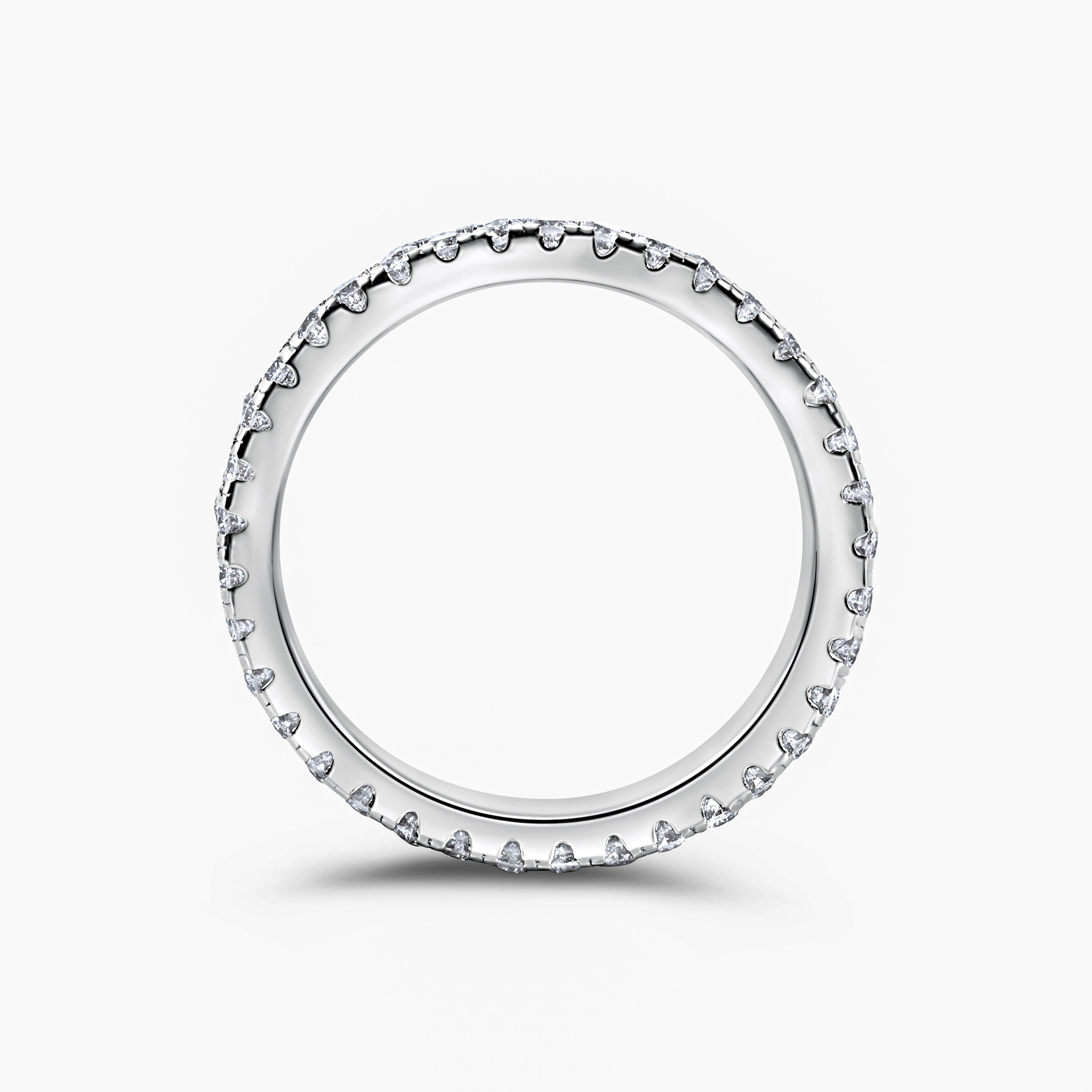 Sterling silver triple eternity ring styled on hand — The Abebi by VH.