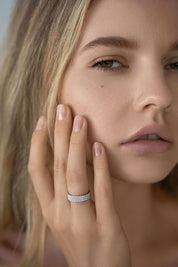 Sterling silver triple eternity ring styled on hand — The Abebi by VH.