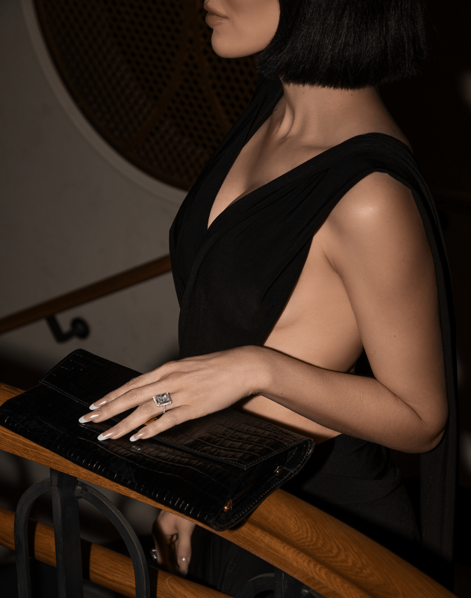Viv Halil wearing the Aurora emerald-cut statement ring in sterling silver with a pavé halo