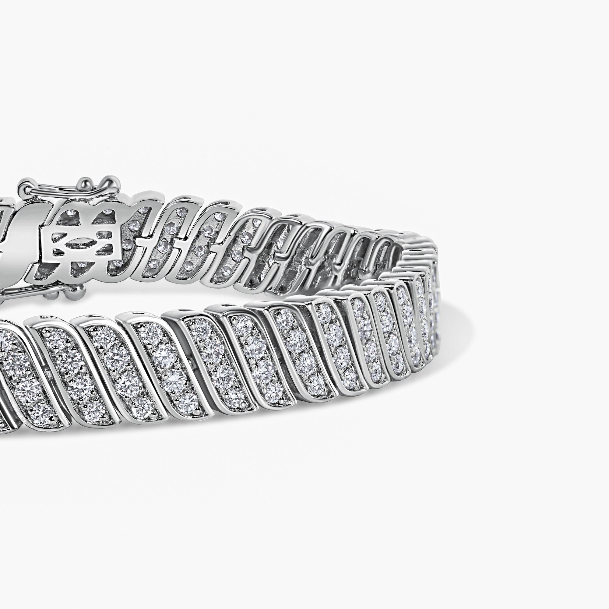 223 moissanite stones pavé-set in a wave link—made from 925 sterling silver by female-founded luxury house Viviana Halil of Beverly Hills. 
