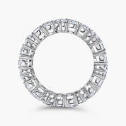 multi shape moissanite eternity band in sterling silver