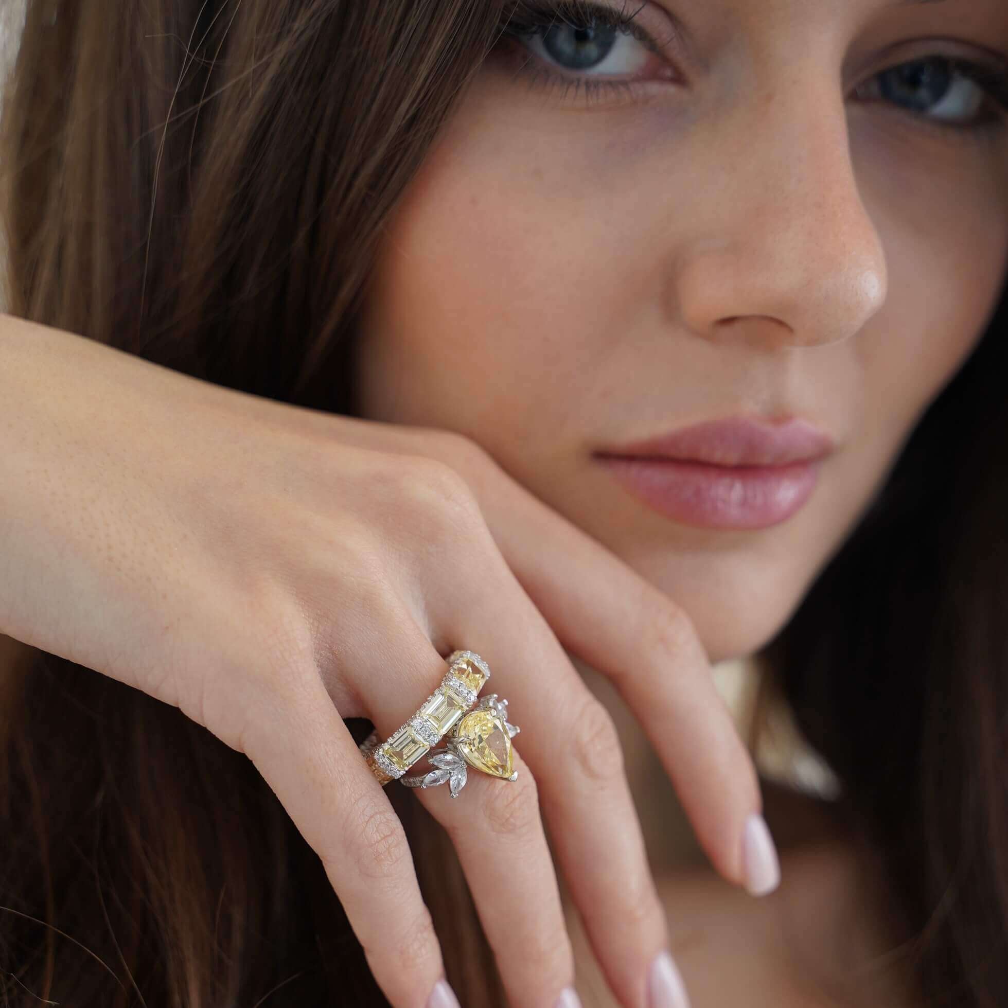 The Gia Ring styled on hand – emerald-cut premium zirconia eternity-style ring by Viviana Halil in pure sterling silver.