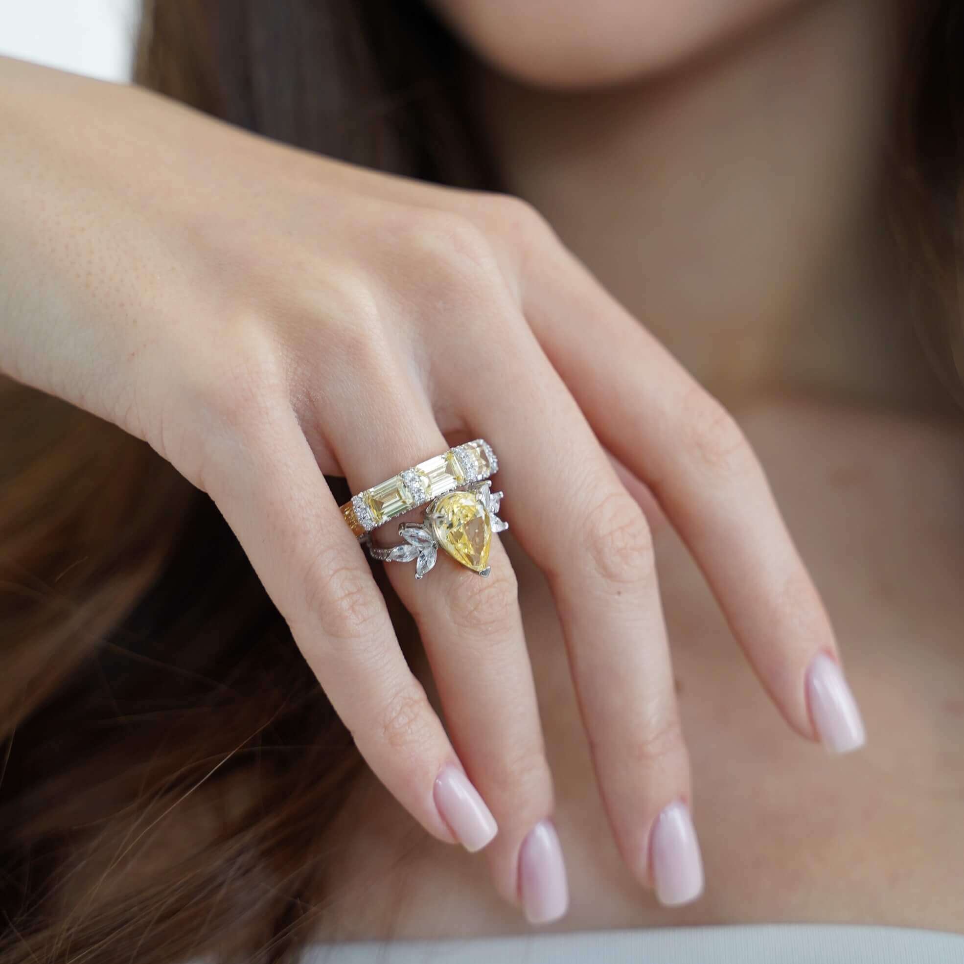 Stacked ring look featuring The Gia Ring paired with another Viviana Halil band for a quiet luxury, diamond-free style.