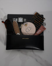 Close-up of The Gia Ring showing emerald-cut premium VH zirconia stones and intertwining pavé band in sterling silver.