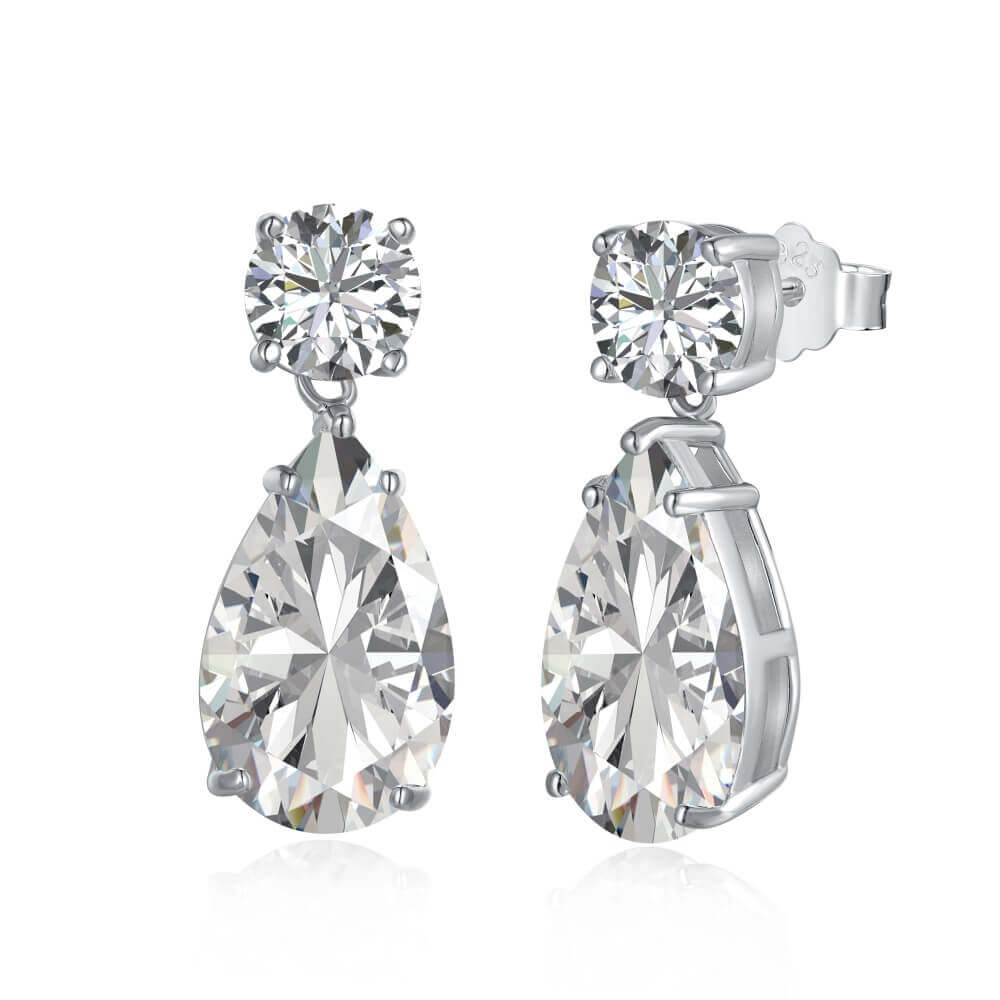 The Le Bijou Earrings feature a round and pear-cut diamond alternative dangle earrings