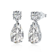 The Le Bijou Earrings feature a round and pear-cut diamond alternative dangle earrings