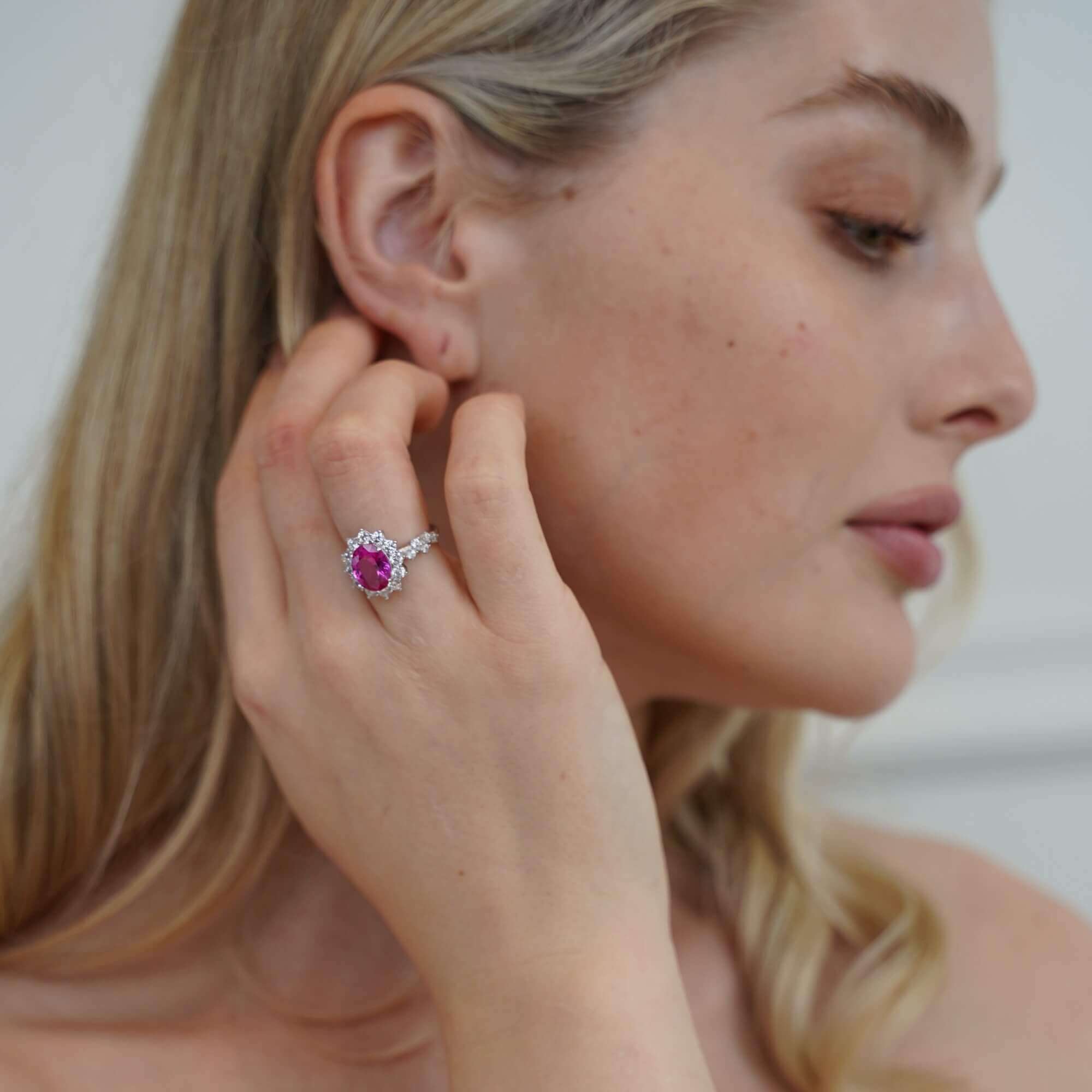 Diamond- free sterling silver halo ring styled on hand — The Lucia Ring by Viviana Halil.