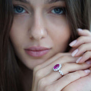 Sterling silver halo ring styled on hand — The Lucia Ring by Viviana Halil.