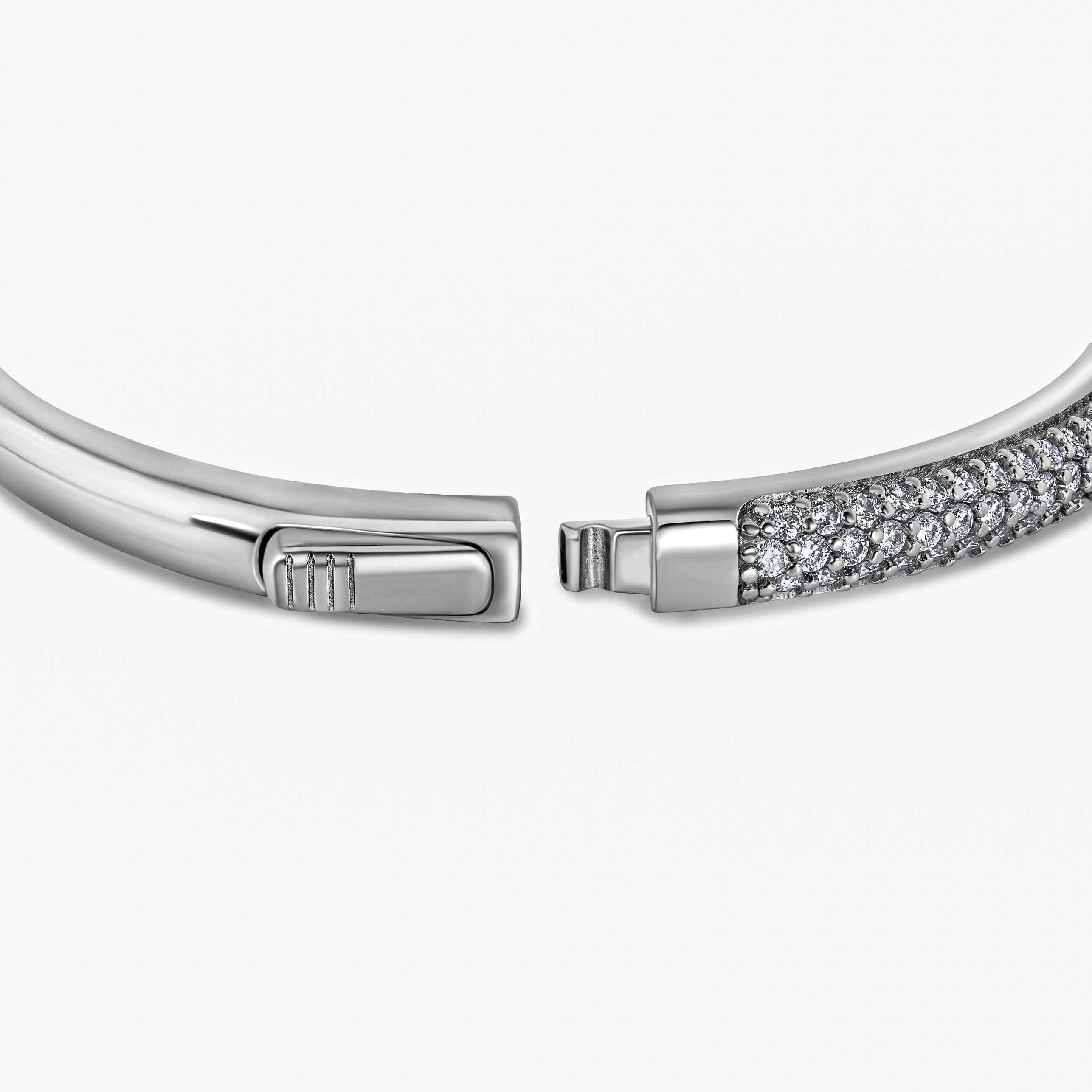 Fine jewelry craftsmanship detail — The Maeve Bangle in pure sterling silver.  