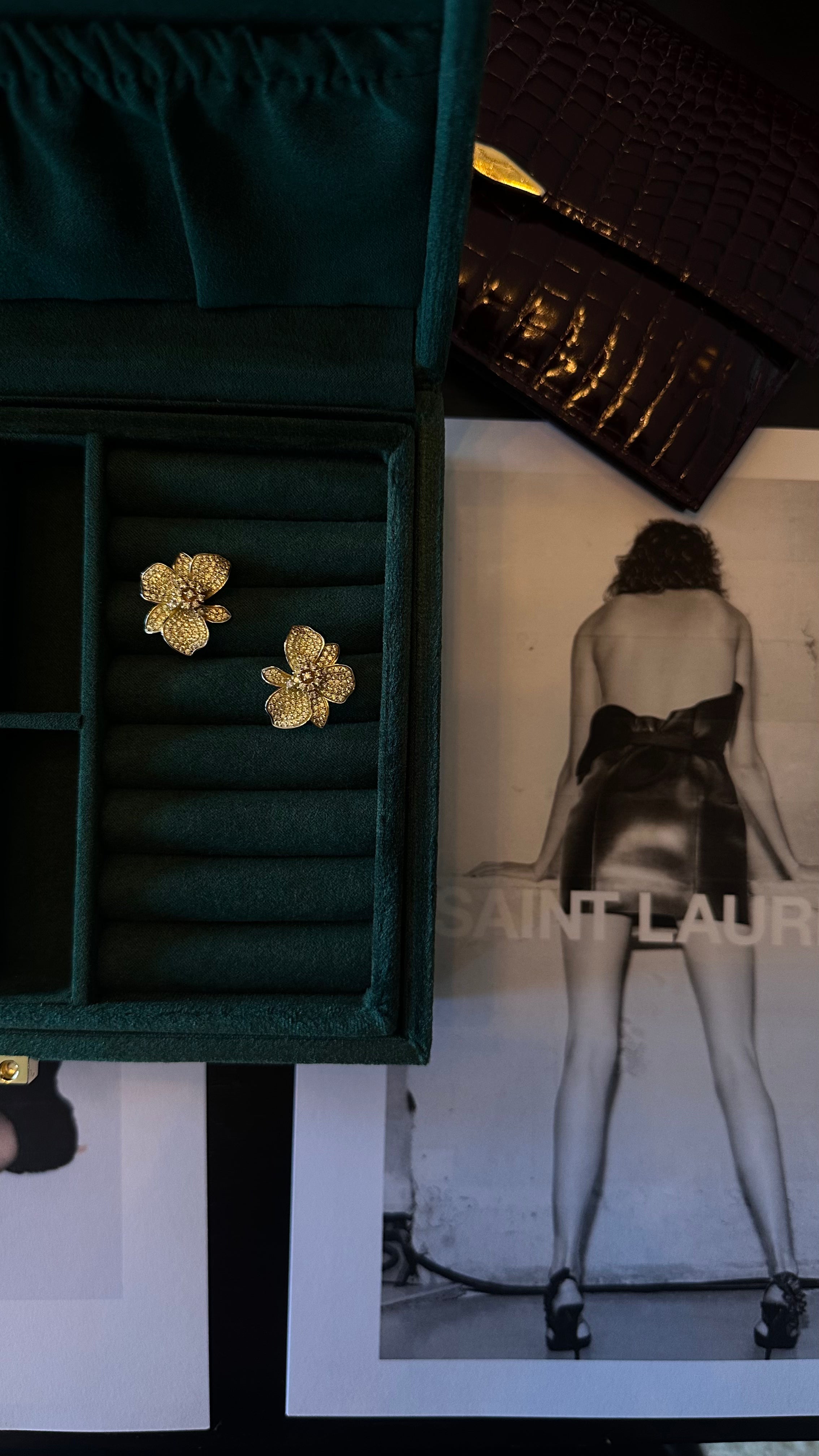 The martha studs a floral silhouette crafted in 18k gold and premium zirconia by viviana halil from beverly hills. 