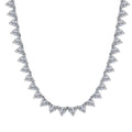 Heart-cut tennis necklace in sterling silver with hand-set 3-prong heart-shaped stones by Viviana Halil