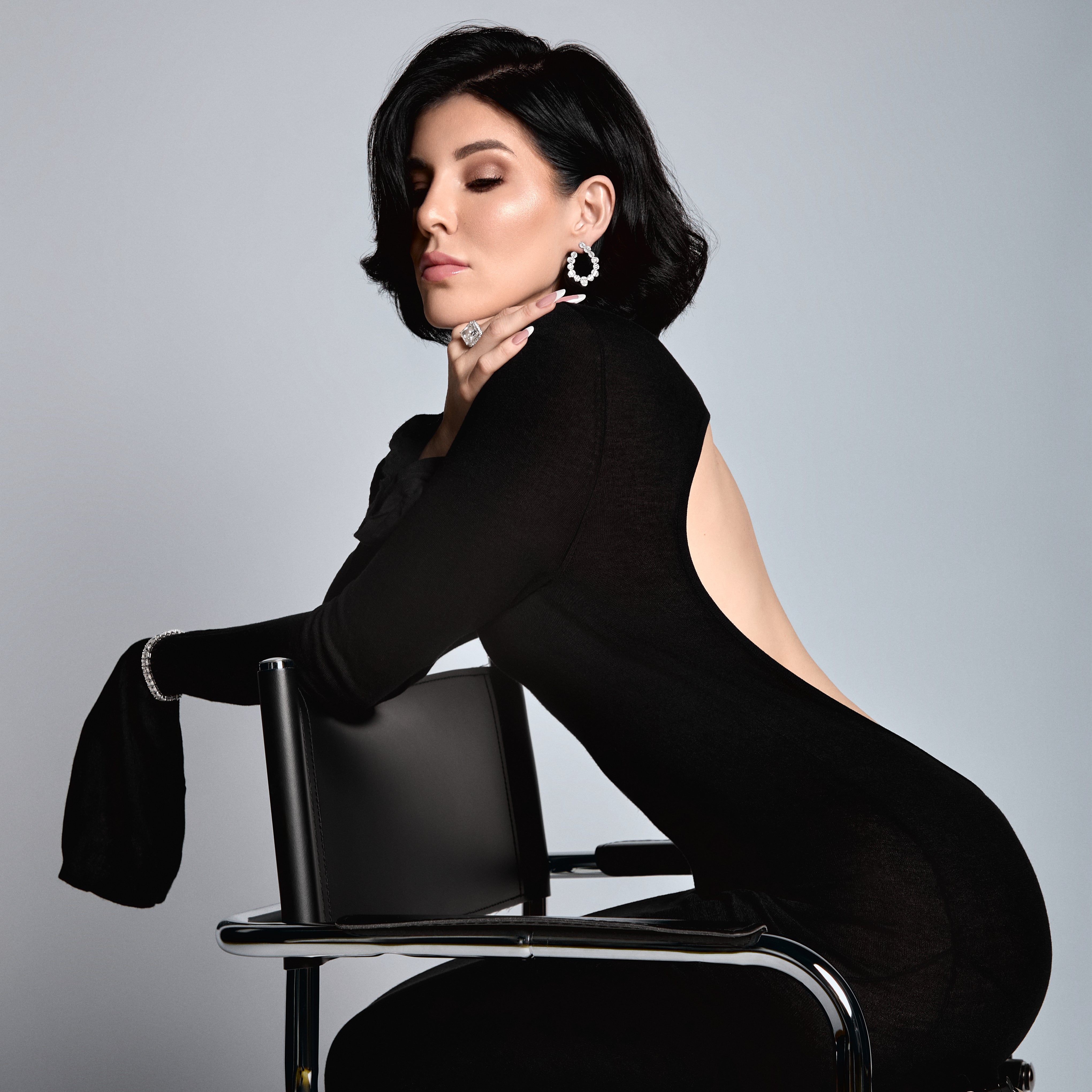 Sterling silver baguette earrings styled on ear — The Ophelia Earrings by Viviana Halil. 