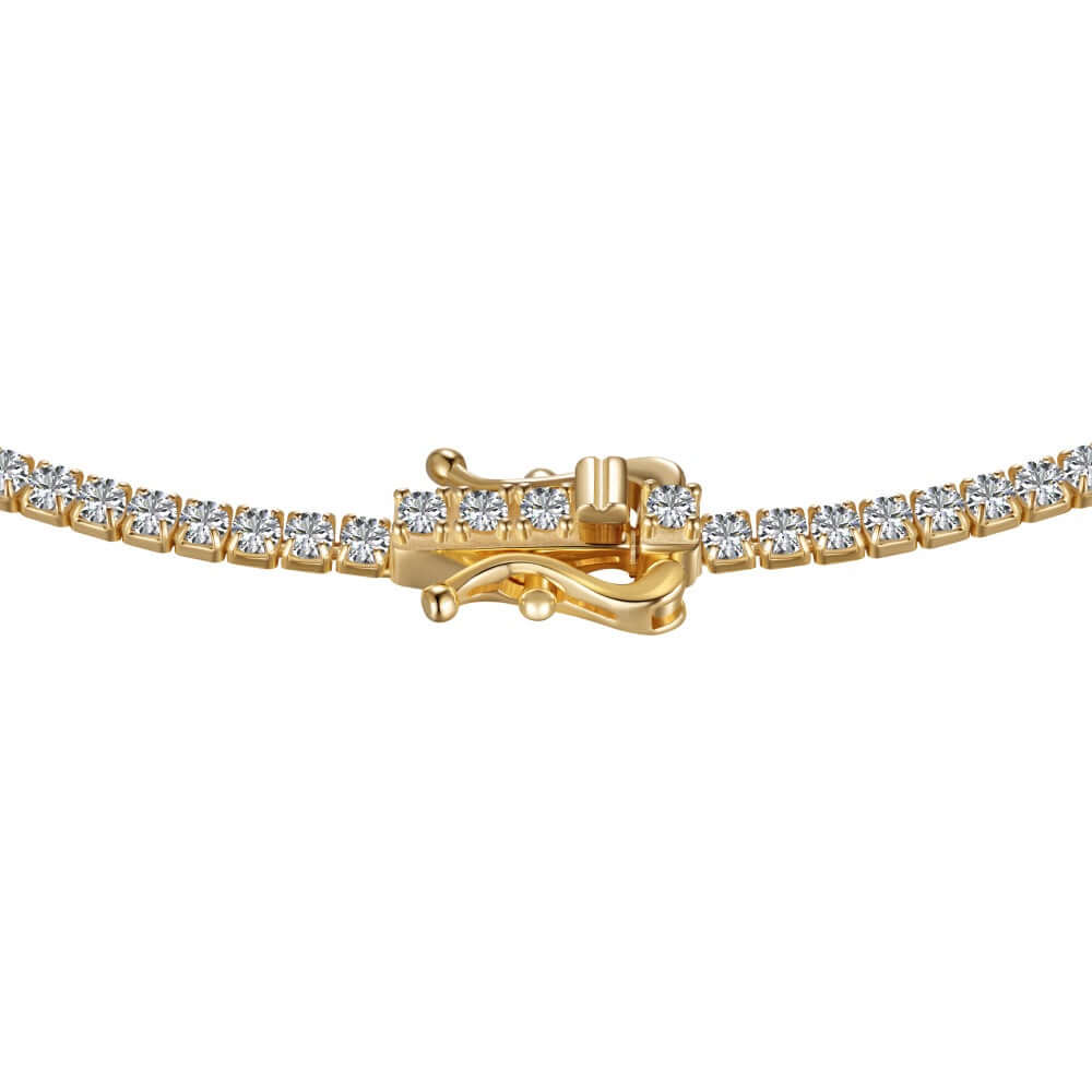 The petite luxxe tenne 18k gold tennis necklace featuring premium grade diamond simulants and a secure closure design by Viviana Halil. 