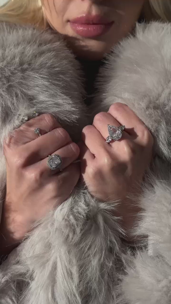 The georgina ring worn by model video of ring and fur coat.