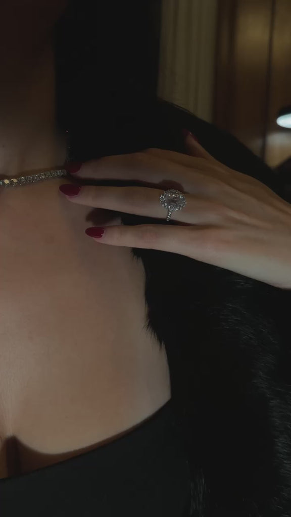 The Mon Cheri Ring by Viviana Halil worn by model in dark bar lounge aesthetics