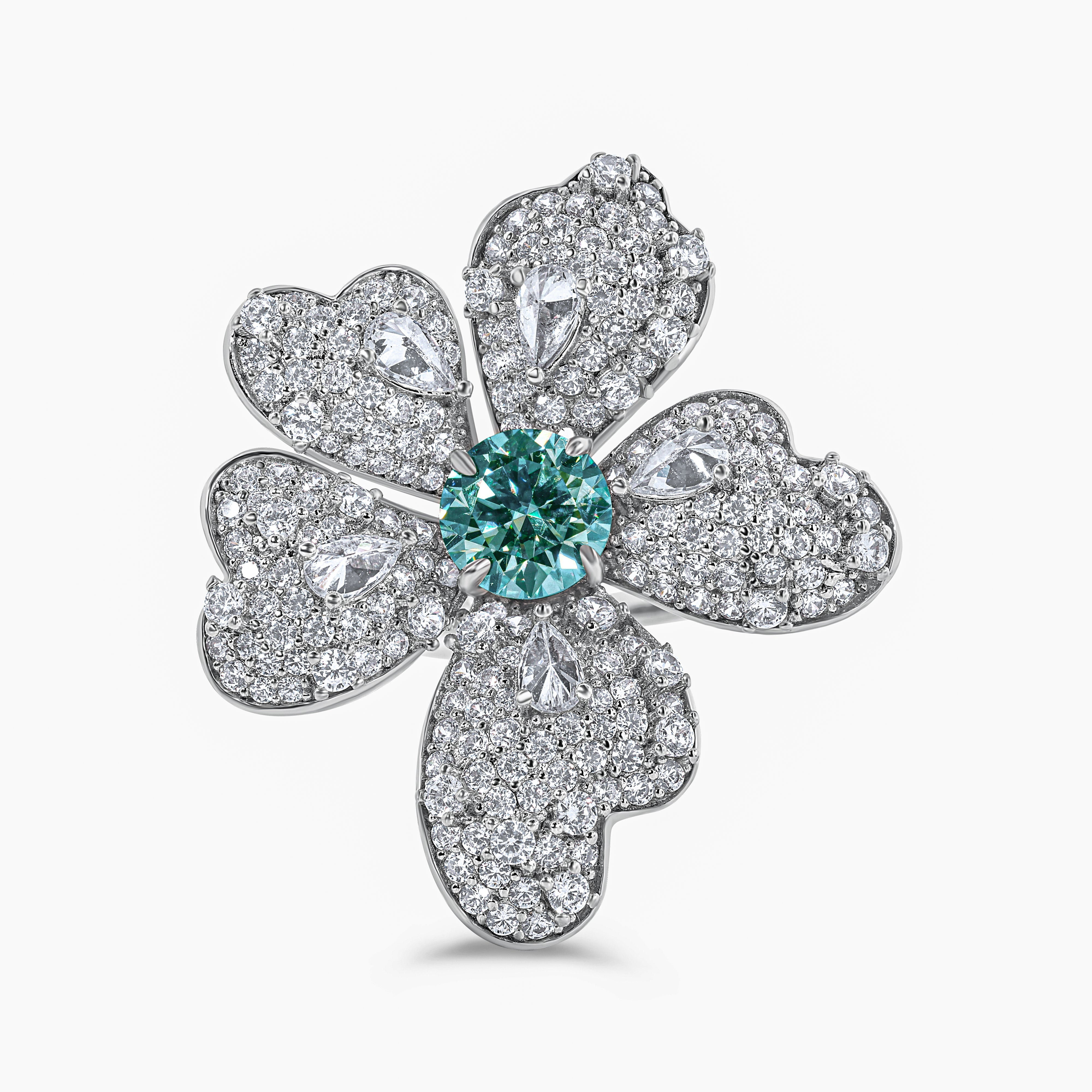 The flower ring crafted with moissanite set on sterling silver a design by Viviana Halil 