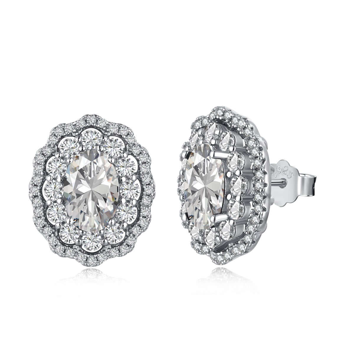 A pair of sterling silver earrings with a double halo setting featuring premium zirconia stones.