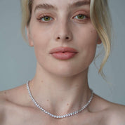 The luxxe tenne 4mm premium zirconia sterling silver tennis necklace worn by model made by Viviana Halil