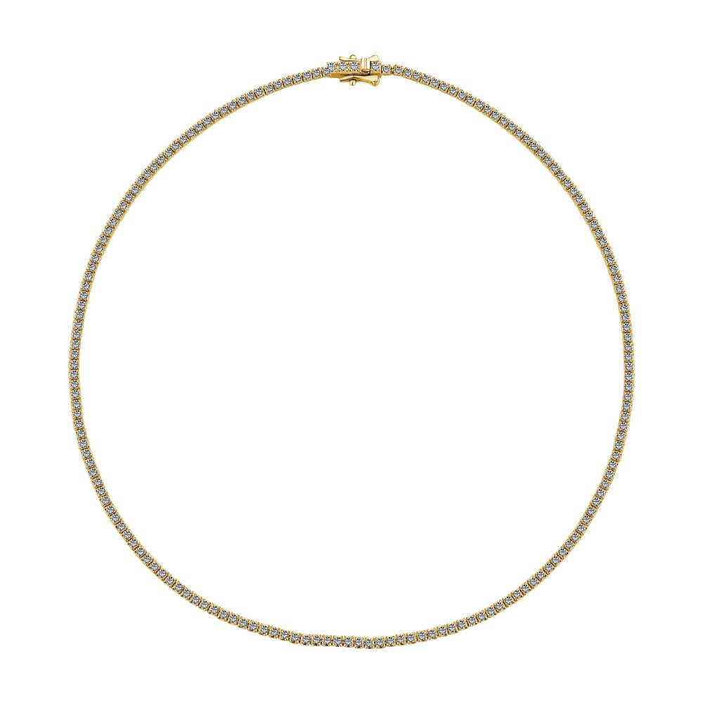 The Petite luxxe tenne 18k gold coated sterling silver tennis necklace featuring a row of premium zirconia stones by Viviana Halil. 