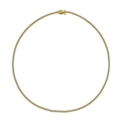The Petite luxxe tenne 18k gold coated sterling silver tennis necklace featuring a row of premium zirconia stones by Viviana Halil. 