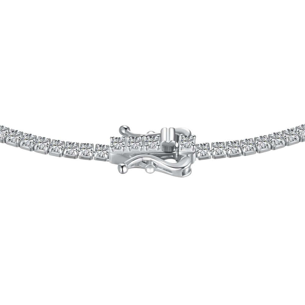 A row of brilliant diamond simulants set on sterling silver tennis necklace by Viviana Halil.

