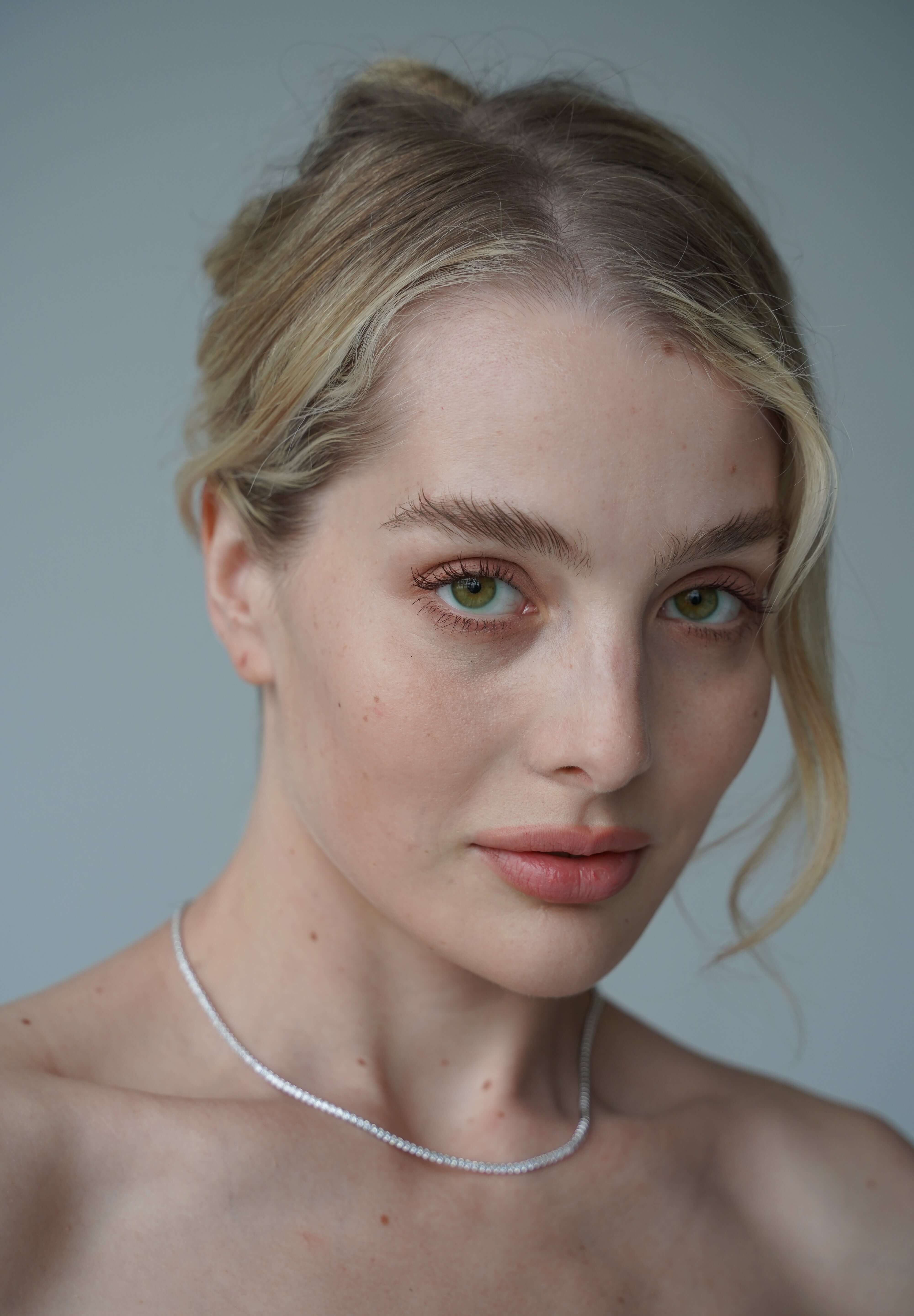 the petite luxxe tenne sterling silver tennis necklace featuring a row of premium grade cubic zirconia design by Viviana Halil. 