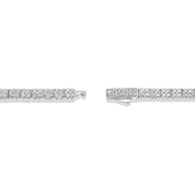 close-up of silver necklace with sculpted links and pavé stones and hidden box clasp closure